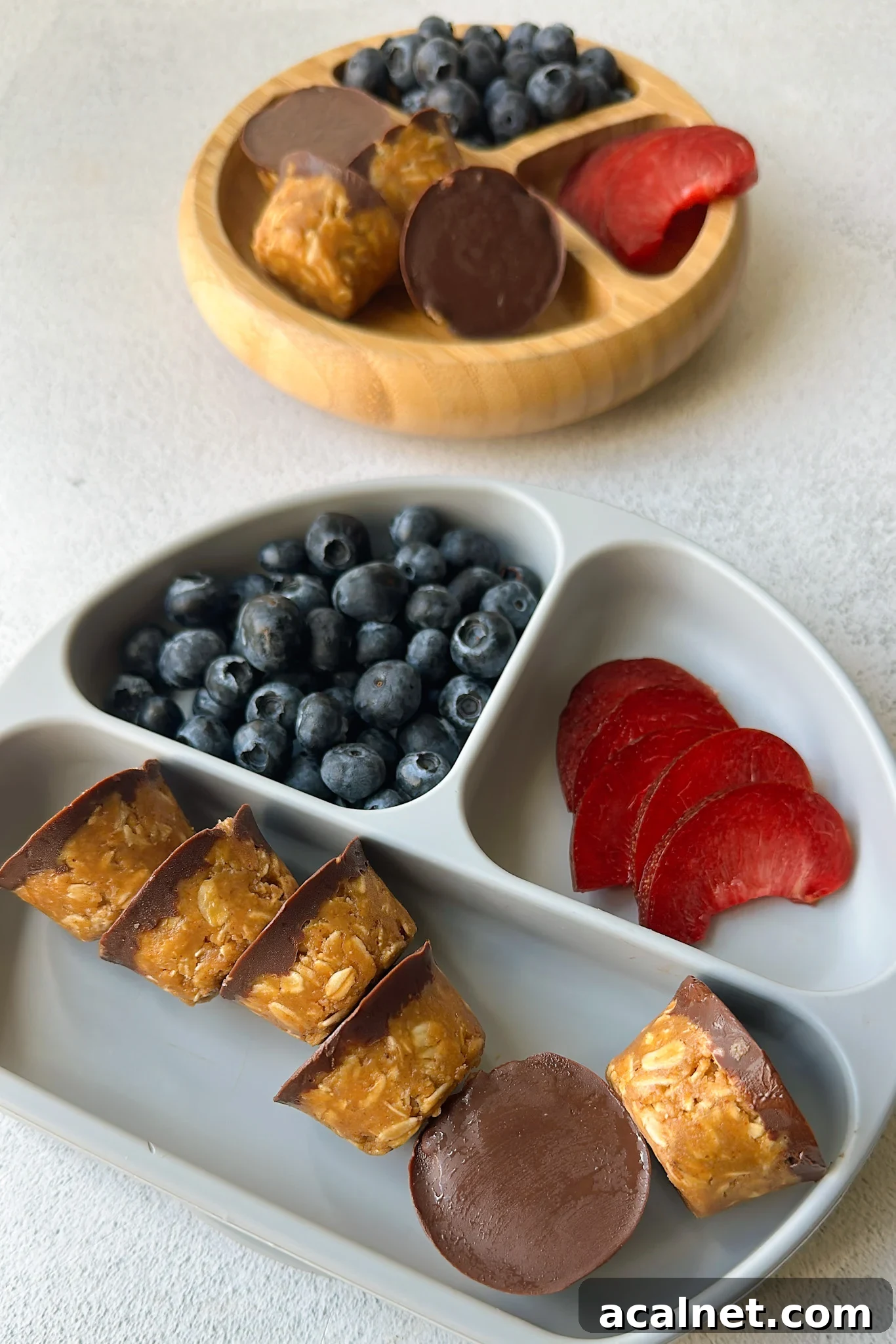 Peanut butter oatmeal cups served with berries.