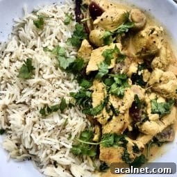A bowl of chicken curry and rice