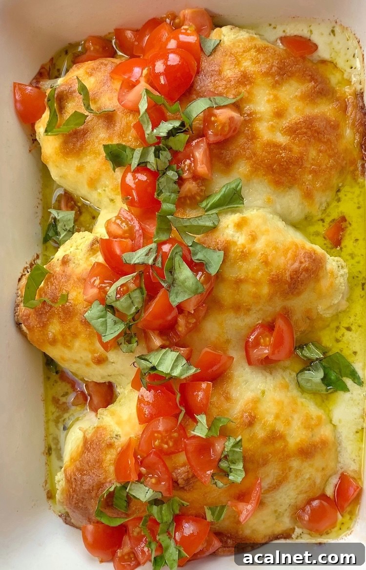 How to make chicken breasts topped with a mixture of cream cheese and basil pesto followed by lots of shredded mozzarella. 