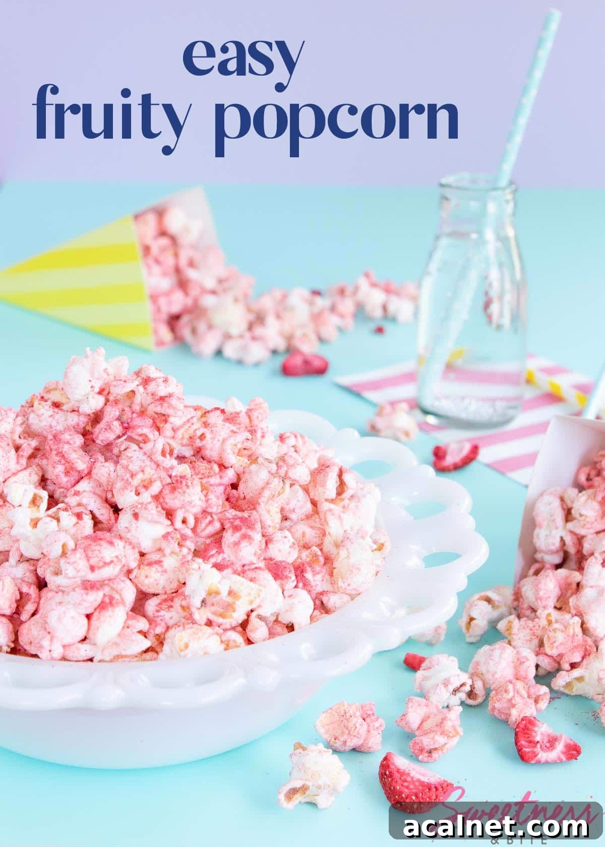 White bowl of pink fruit-flavoured popcorn