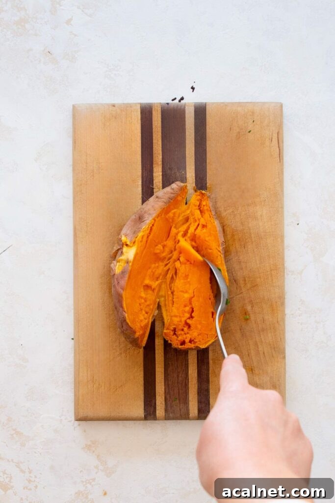removing cooked flesh from a microwaved sweet potato