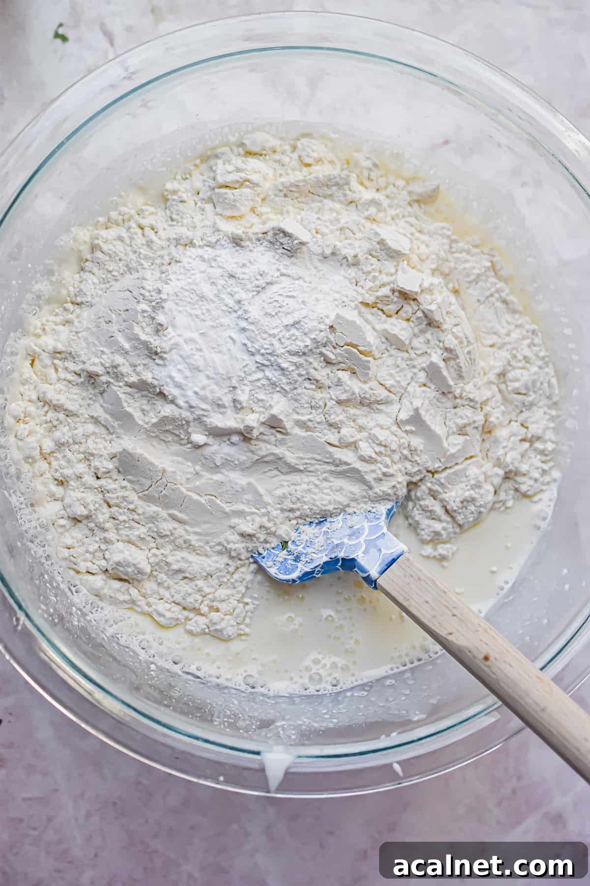 Fluffy Pancakes Made with Cake Flour: Light, Tender Stacks 5 The dry ingredients are added to the bowl with the wet ingredients.