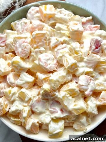 overhead shot of mayo fruit salad in shallow dish.