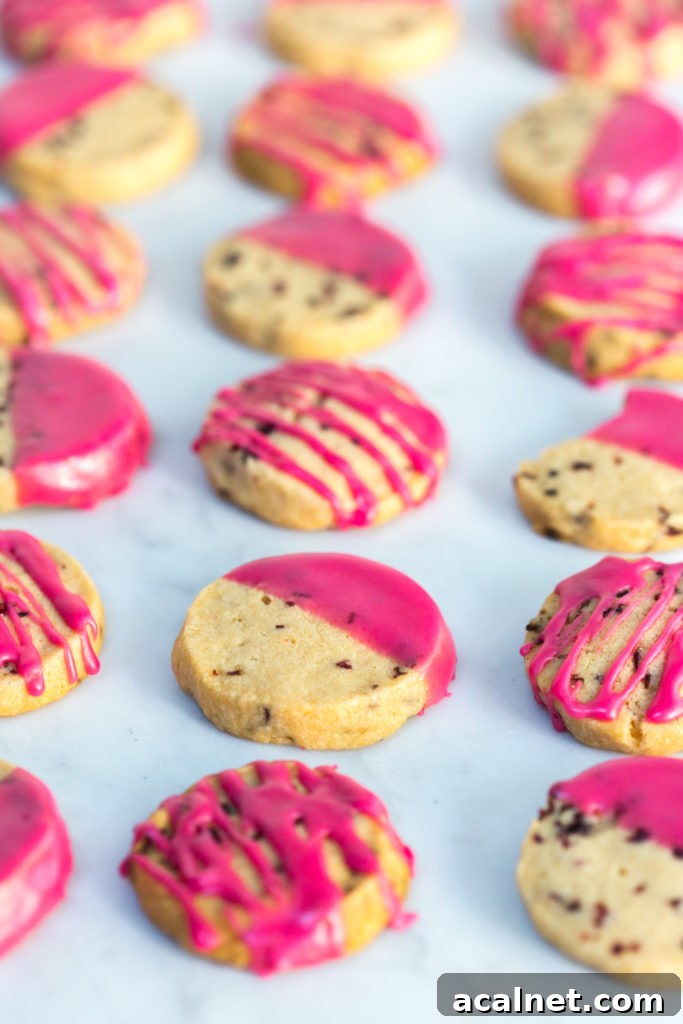 Glazed Hibiscus Shortbread Cookies dipped and drizzled