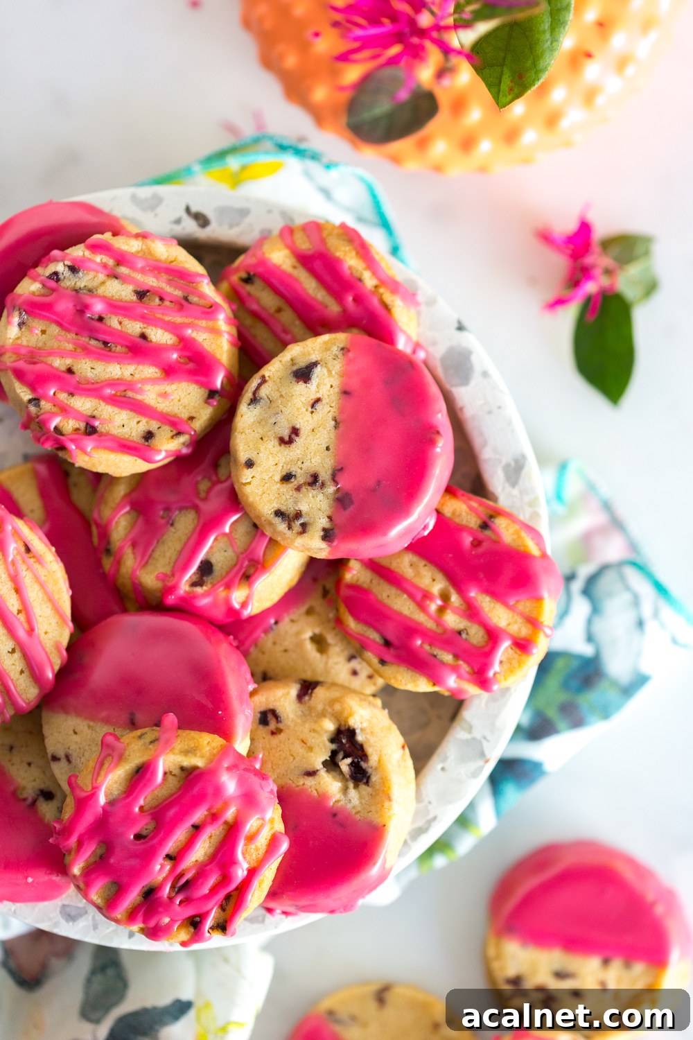 Plateful of Glazed Hibiscus Shortbread Cookies