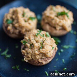 Garlic and parmesan stuffed mushrooms - the perfect easy appetizer for vegetarians and carnivores alike!