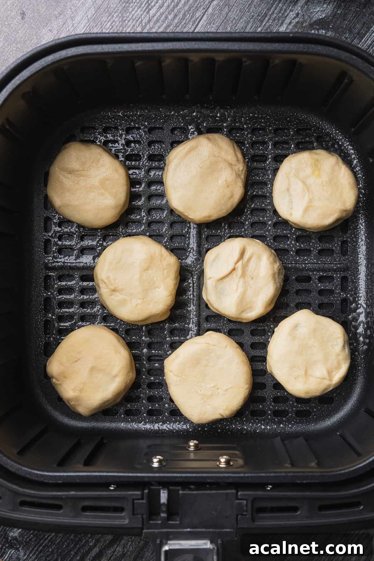 Air Fryer Oreo Bites — 3-Ingredient Dessert Recipe 7 The uncooked oreos in the air fryer basket.