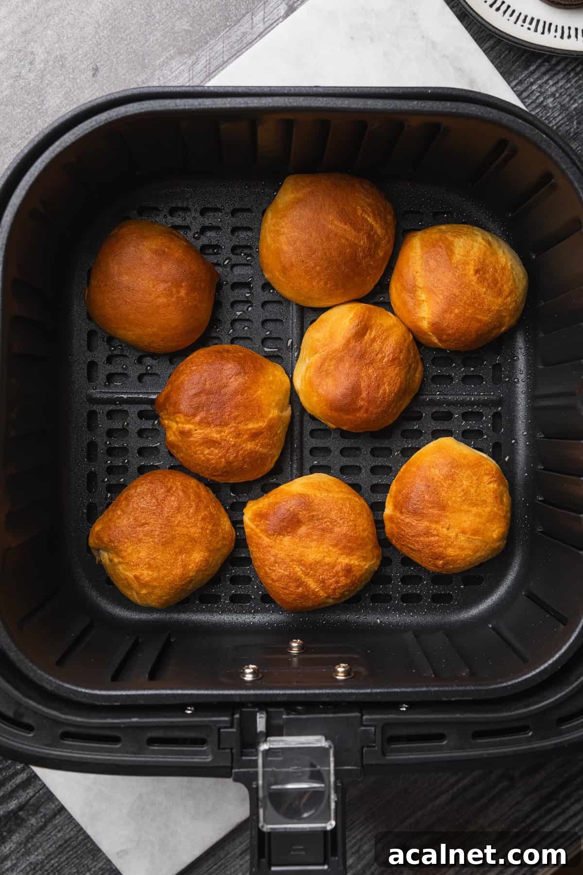 Air Fryer Oreo Bites — 3-Ingredient Dessert Recipe 8 Golden brown air fried oreos in the basket.