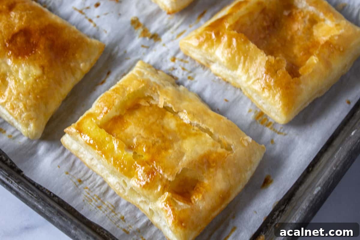 A puff pastry shell with the center pushed down.
