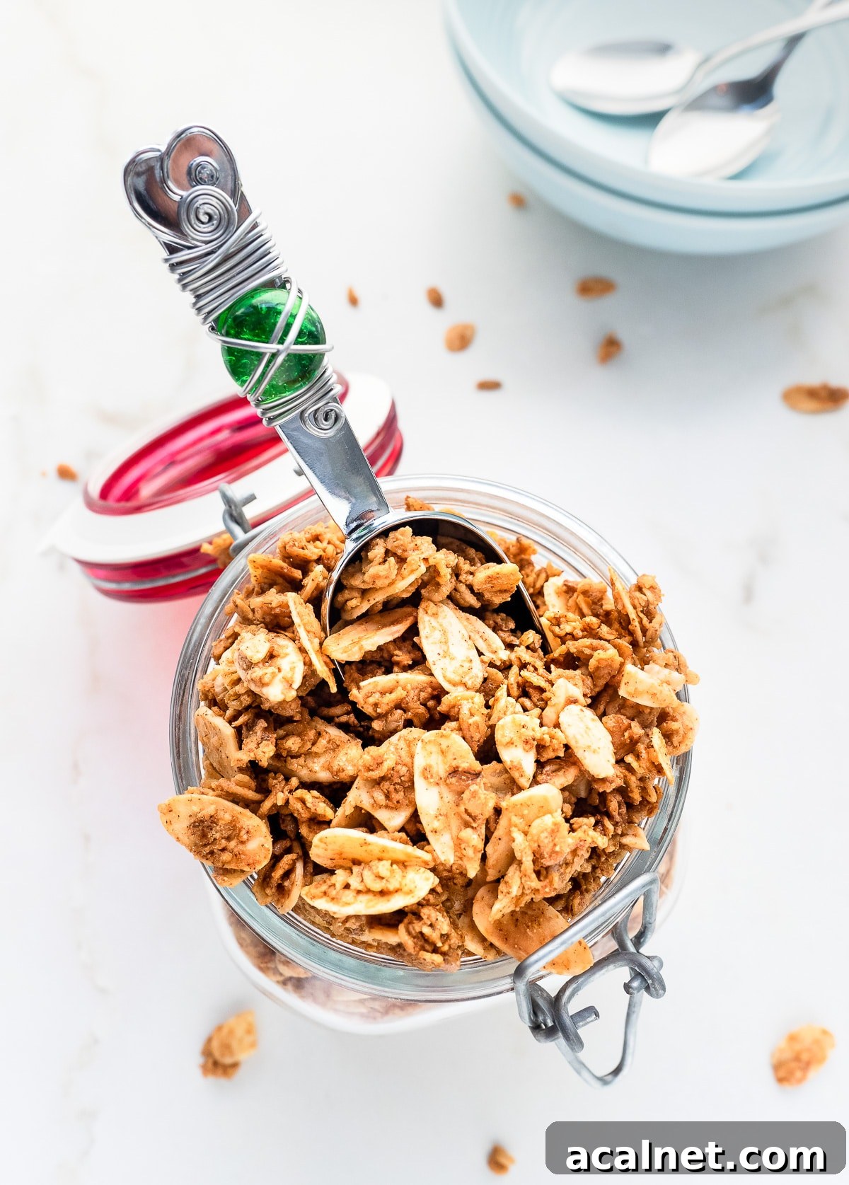 Top view of a mason jar filled with homemade vanilla almond granola.