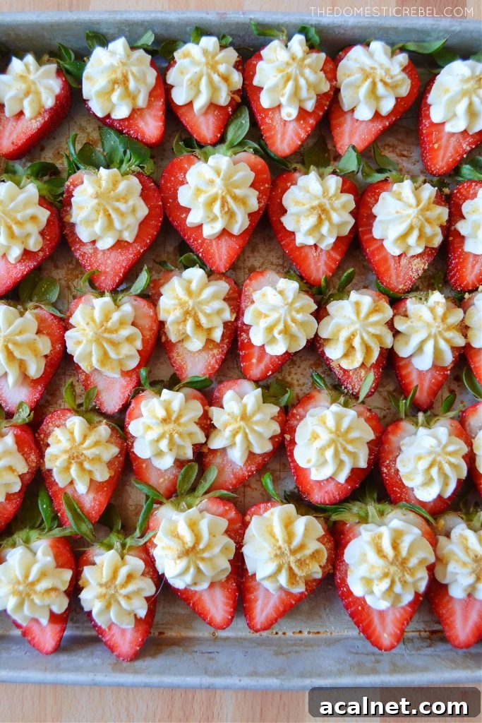 a pan filled with cheesecake deviled strawberries