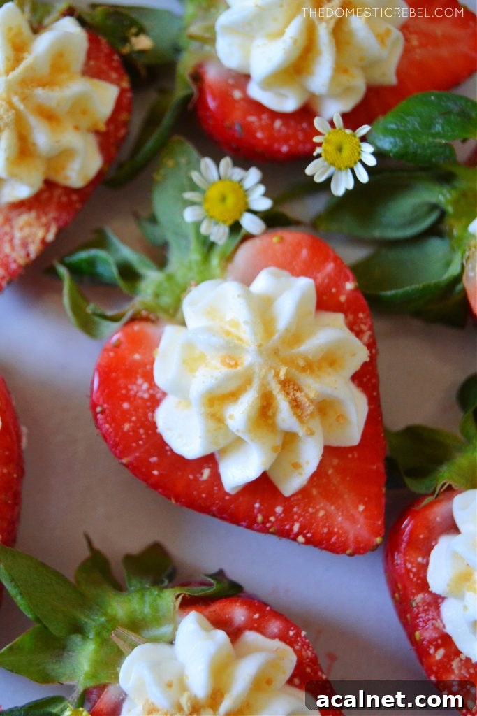 closeup shot of a cheesecake deviled strawberry with little daisies