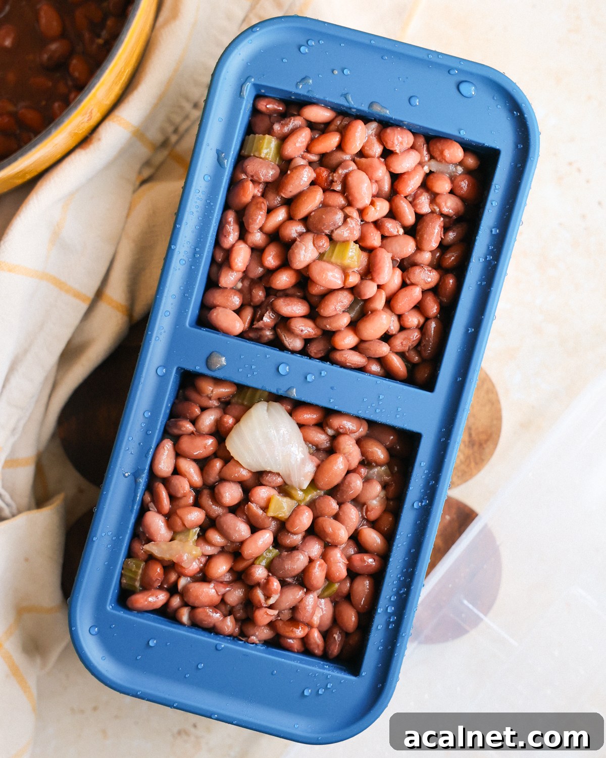 Beans in freezer container.