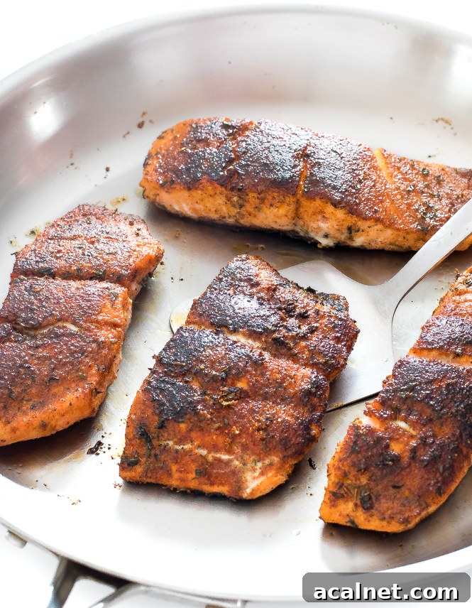 Searing blackened cajun salmon in a hot pan | chefsavvy.com Searing blackened cajun salmon in a hot pan