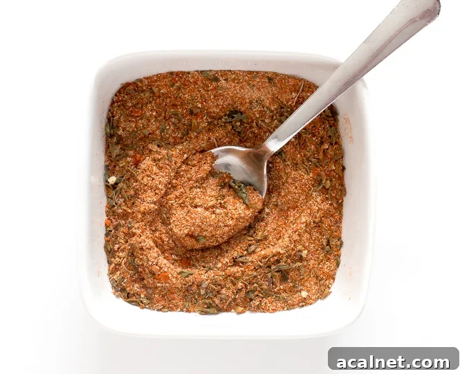 Blackened Salmon Recipe: Bold Cajun Seasoned Pan-Seared Fillet 2 blackening seasoning in white bowl with spoon