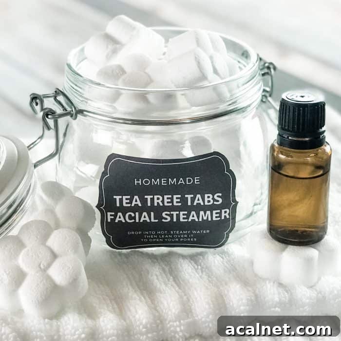 homemade tea tree tabs facial steamer with essential oil in open glass jar with custom label next to essential oil bottle