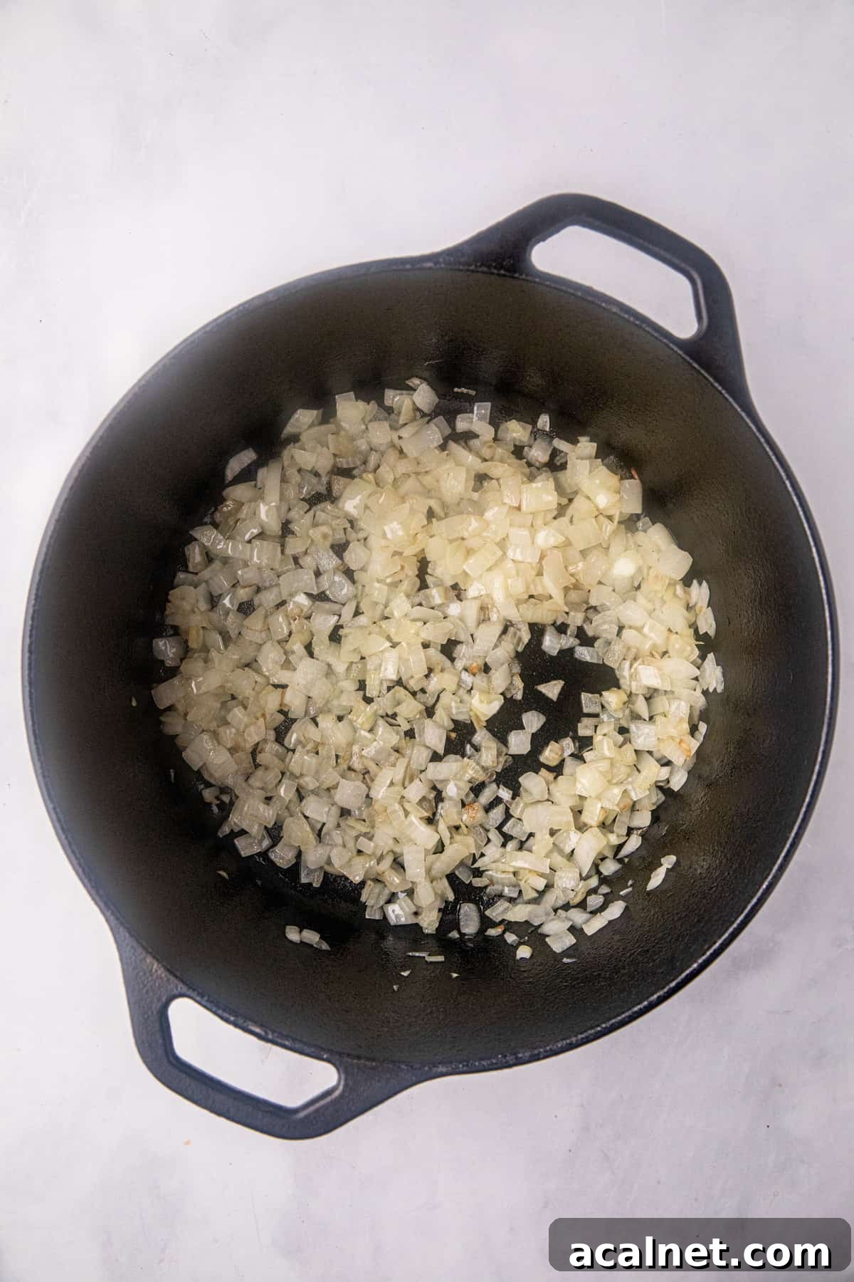 Cooking diced onions for Smoked Brisket Chili recipe