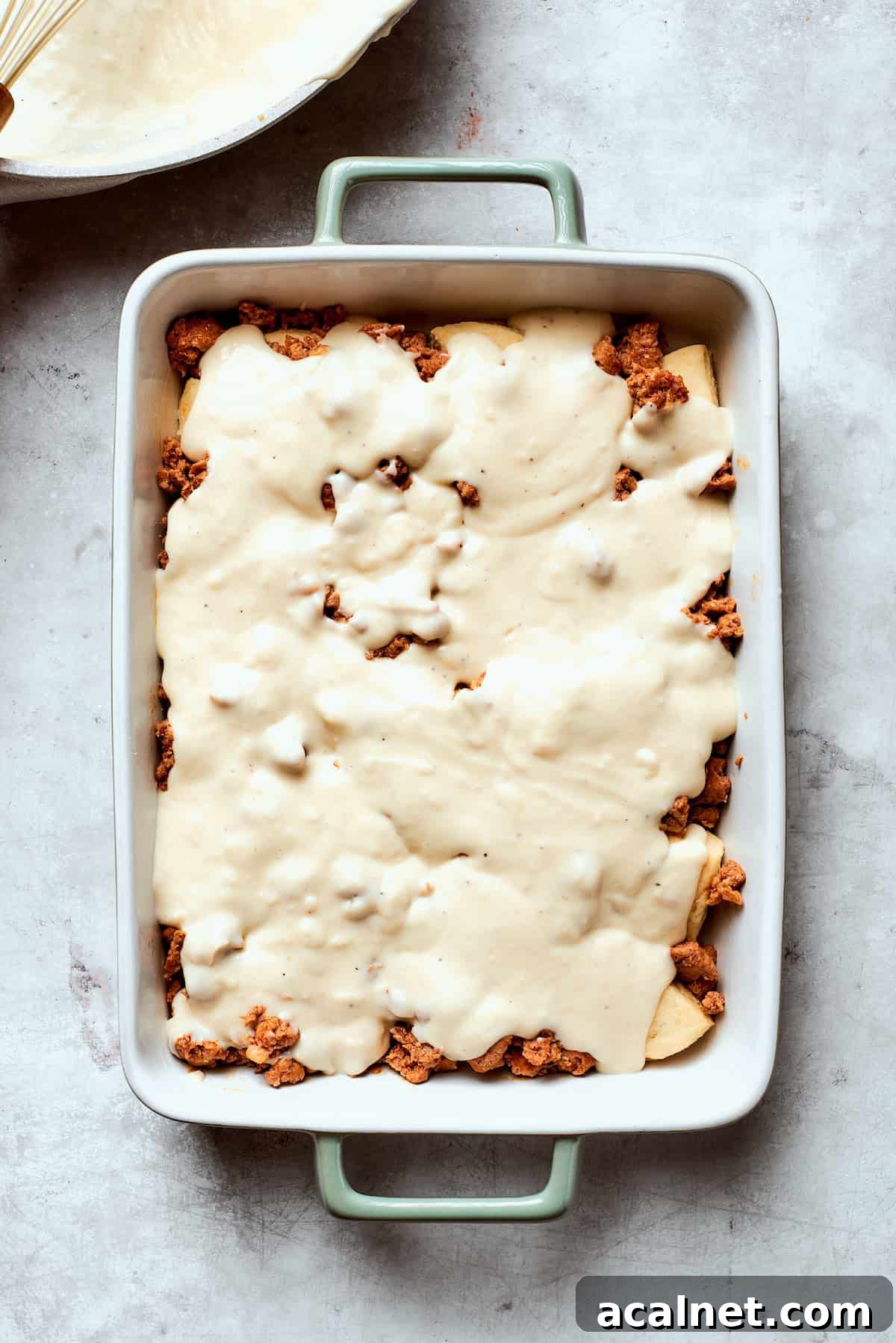 Pour on gravy Gravy is added to biscuits and gravy casserole.