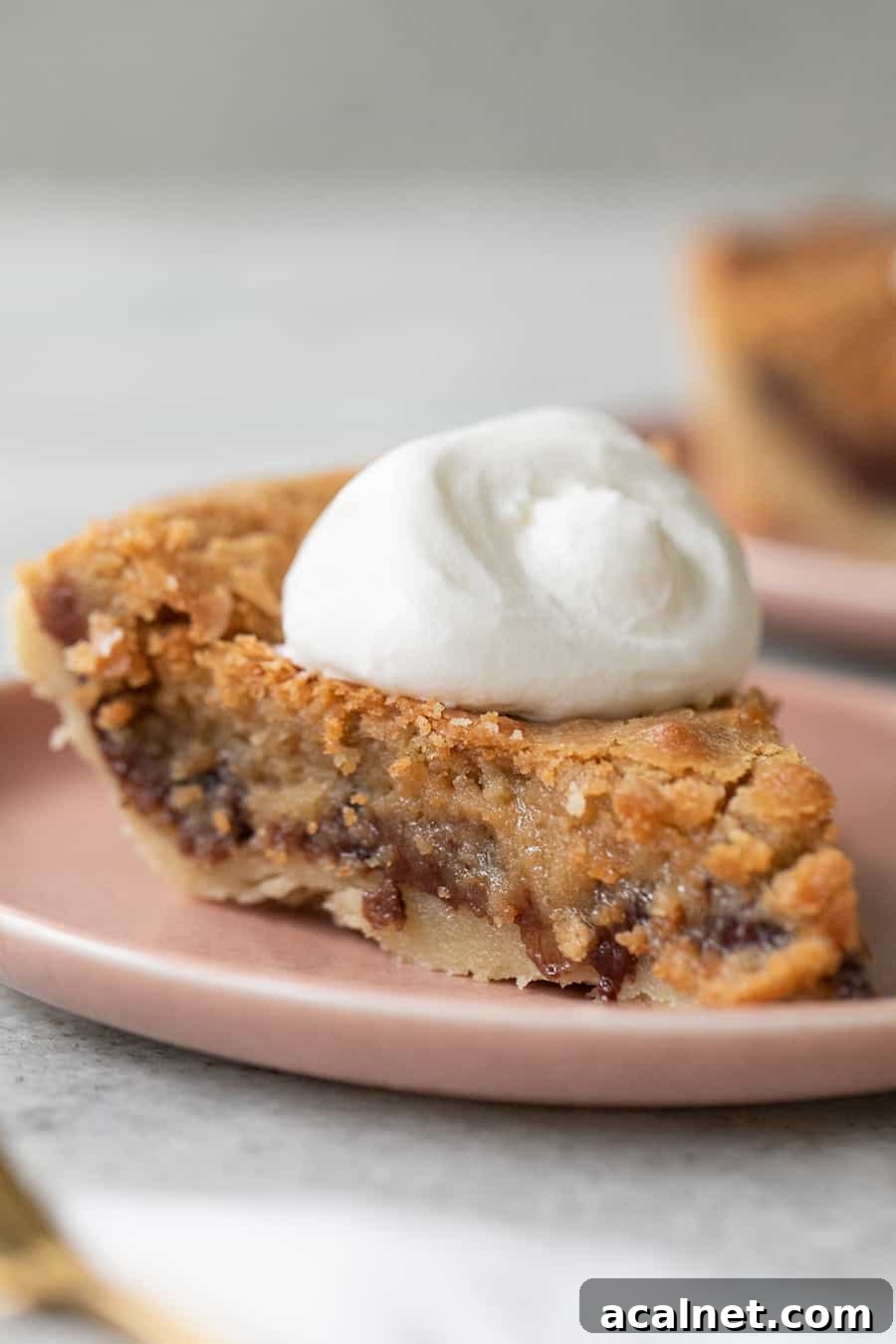 Chocolate chip cookie pie with whipped cream.