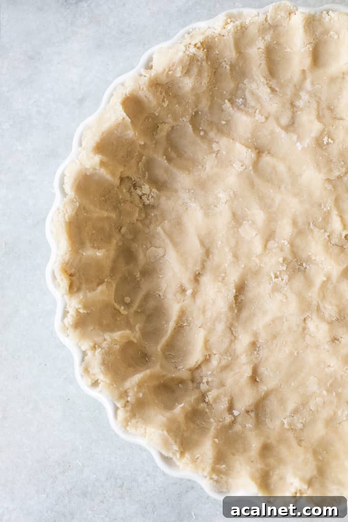 Shortbread pie crust pressed into a pie dish