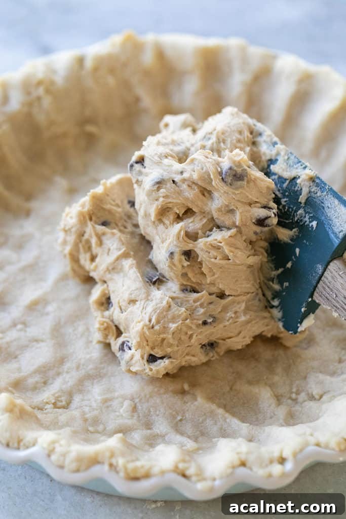 Chocolate chip cookie pie batter.