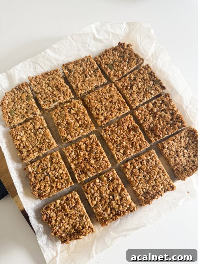 Nut-Free Oat Flapjacks Recipe — Gluten-Friendly Snack 6 Nut free flapjacks fresh out of the oven and cut into even squares, ready to eat.