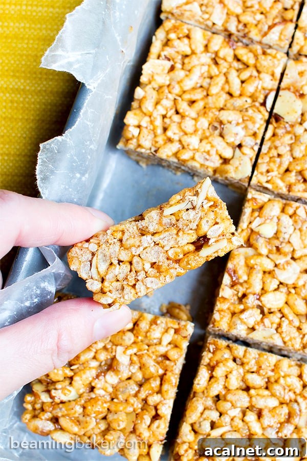 Toasted Coconut Almond Rice Crispy Treats — Vegan & Gluten-Free 4 Toasted Coconut Almond Rice Crispy Treats (V+GF): an easy, 5 ingredient recipe for sweetly satisfying, protein-packed toasted coconut rice crispy treats. #Vegan #GlutenFree #DairyFree | BeamingBaker.com