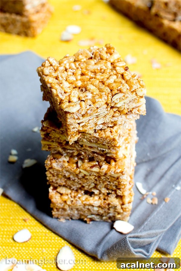 Toasted Coconut Almond Rice Crispy Treats — Vegan & Gluten-Free 5 Toasted Coconut Almond Rice Crispy Treats (V+GF): an easy, 5 ingredient recipe for sweetly satisfying, protein-packed toasted coconut rice crispy treats. #Vegan #GlutenFree #DairyFree | BeamingBaker.com