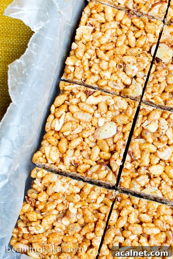 Toasted Coconut Almond Rice Crispy Treats — Vegan & Gluten-Free 6 Toasted Coconut Almond Rice Crispy Treats (V+GF): an easy, 5 ingredient recipe for sweetly satisfying, protein-packed toasted coconut rice crispy treats. #Vegan #GlutenFree #DairyFree | BeamingBaker.com