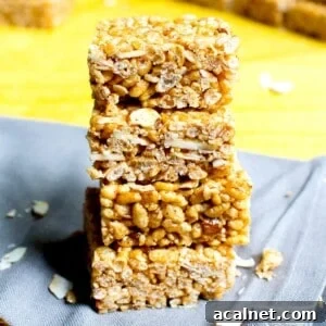 Toasted Coconut Almond Rice Crispy Treats — Vegan & Gluten-Free 9 Toasted Coconut Almond Rice Crispy Treats (V+GF): an easy, 5 ingredient recipe for sweetly satisfying, protein-packed toasted coconut rice crispy treats. #Vegan #GlutenFree #DairyFree | BeamingBaker.com