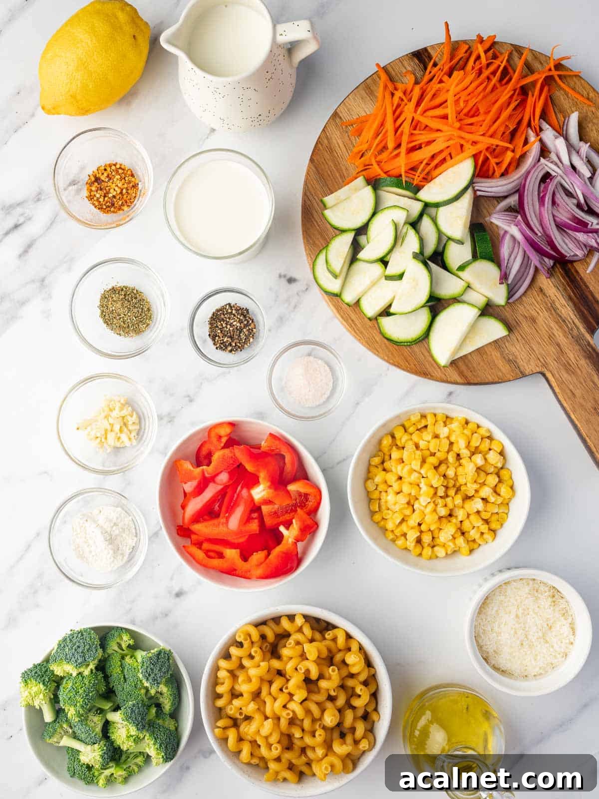 Ingredients needed for creamy veggie pasta.