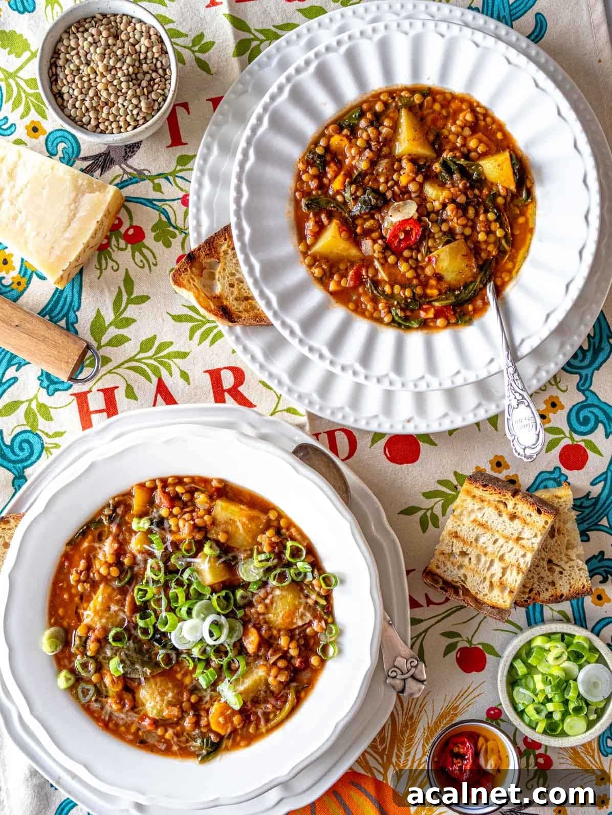 Comforting Lentil Soup with Vegetables and Herbs 2 two lentil soups on a table with bread