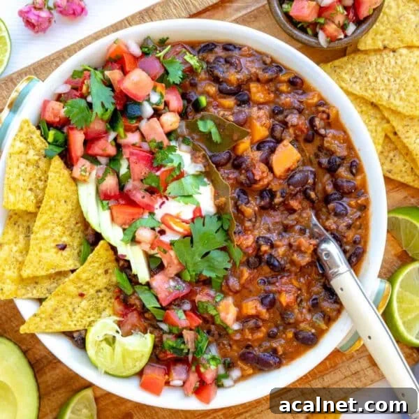 Comforting Lentil Soup with Vegetables and Herbs 16 Black bean soup in a white bowl as a healthy soup meal.