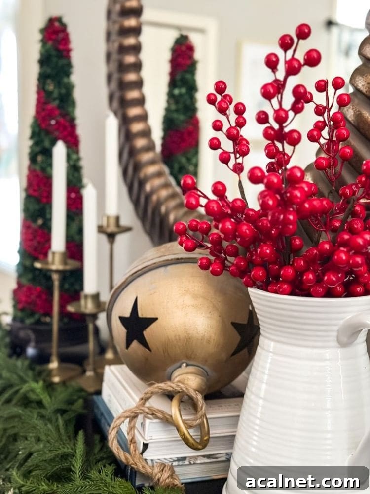 Christmas decorations on a foyer console table