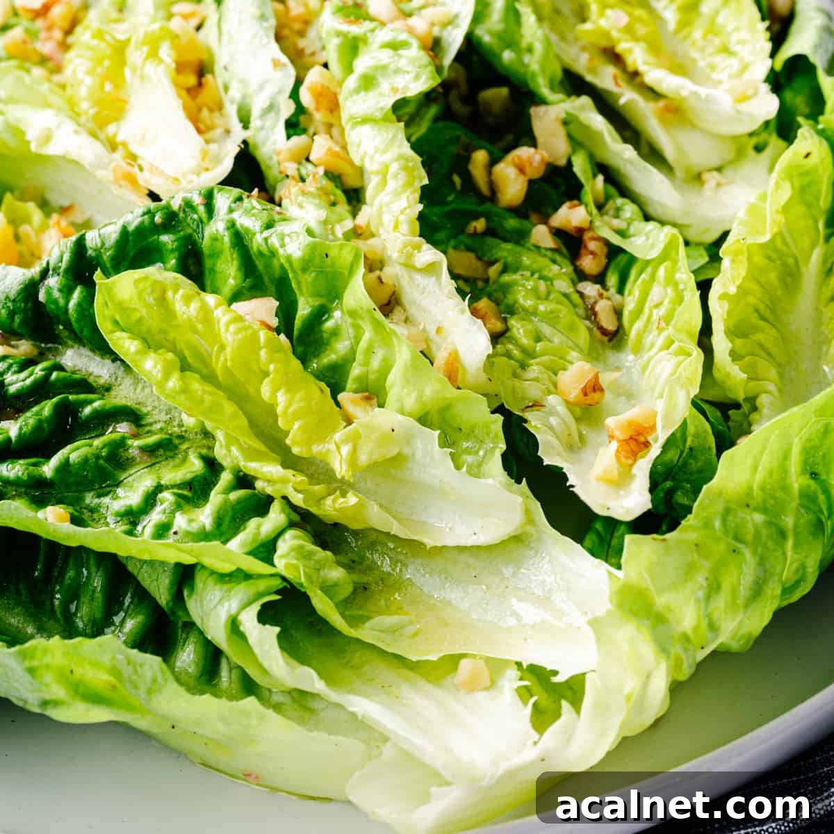 Little Gem Salad served on a white platter.
