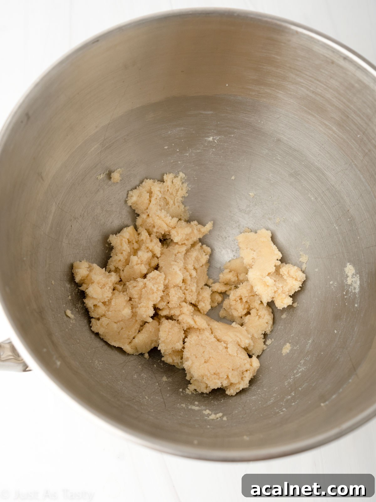 Creamed butter and sugar in a bowl.