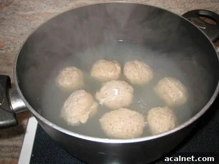 Whole Wheat Matzo Balls Recipe for Light, Fluffy Soups 4 Matzo balls simmering