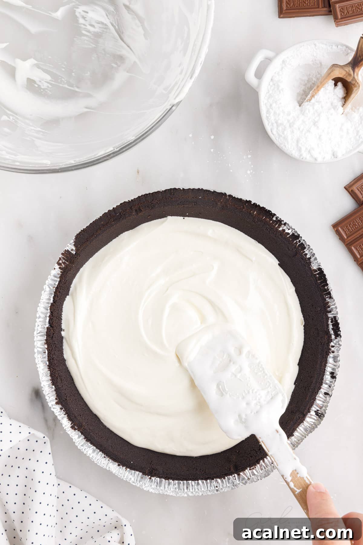 Cream cheese mixture spread on the bottom of the chocolate pie crust.