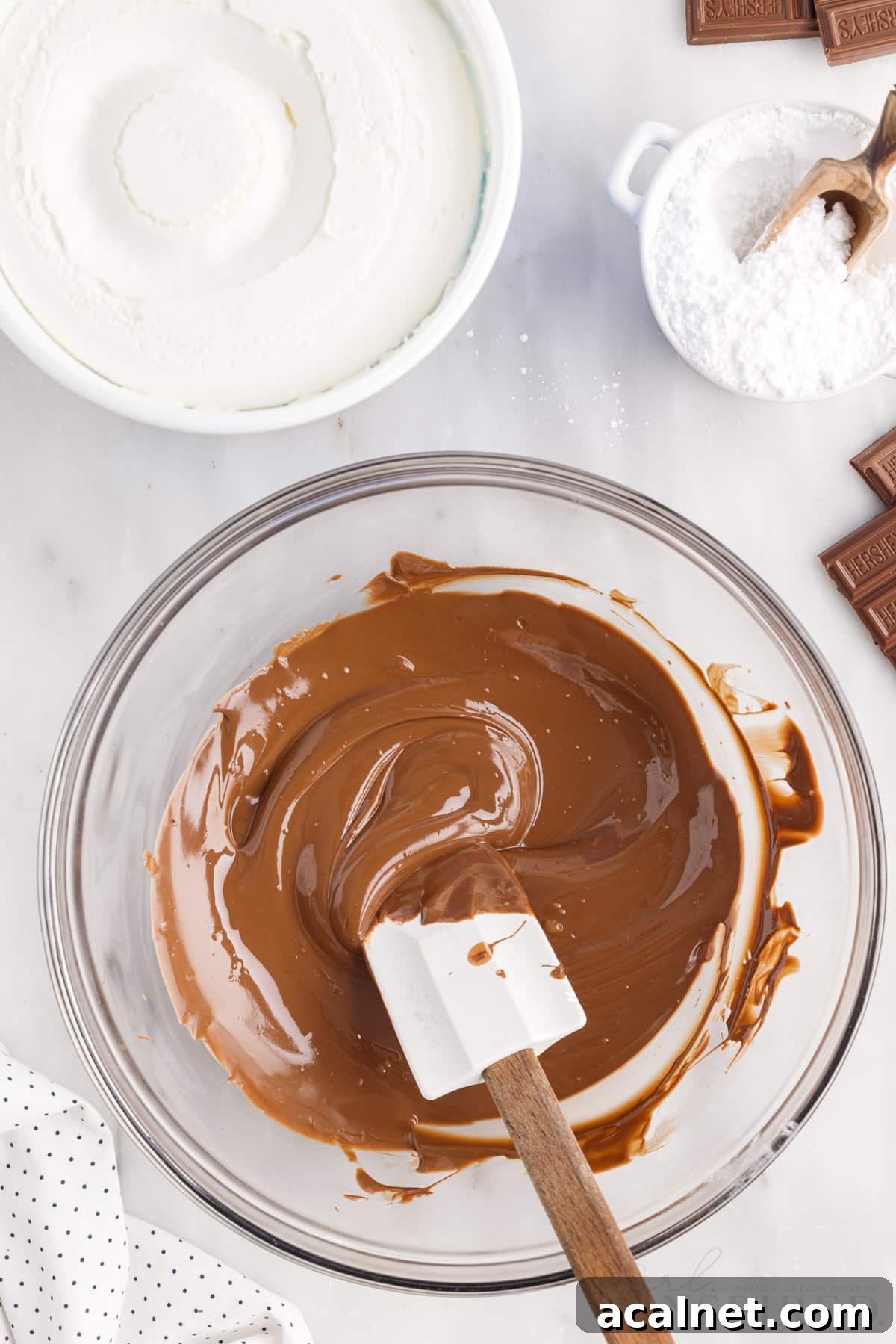 Hershey bars after being melted in a mixing bowl.