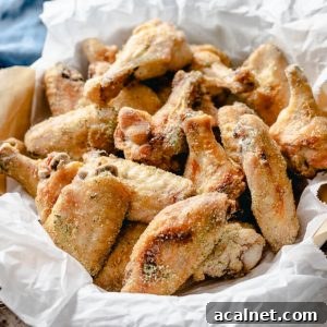 Tangy ranch chicken wings pieces in a basket.