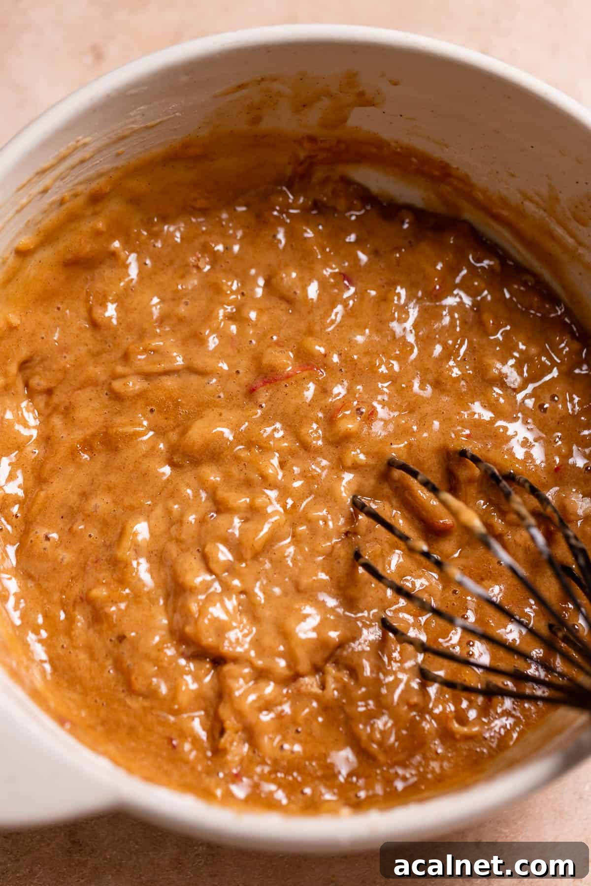 A mixing bowl with the cider cake batter.