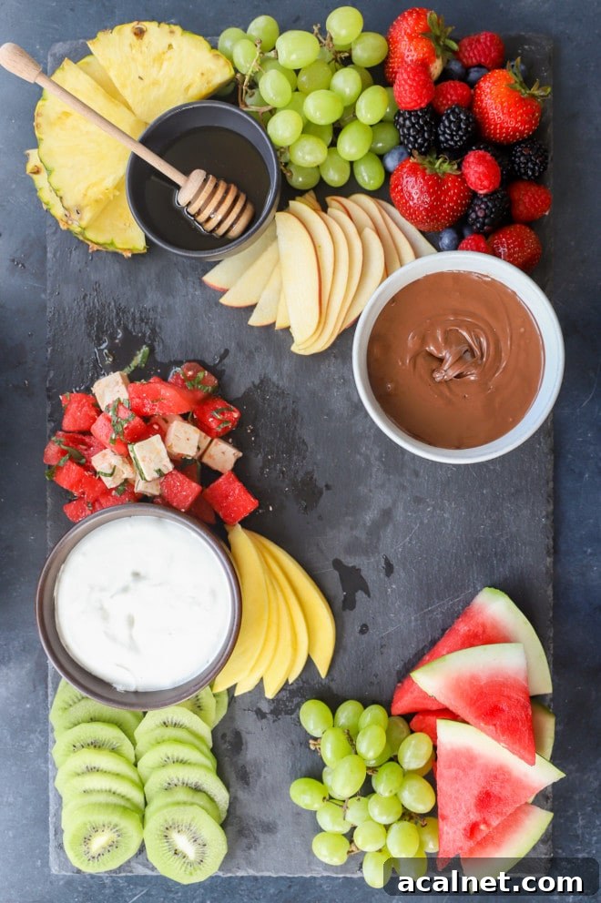 Fresh Fruit Charcuterie Board Ideas for Entertaining 6 Image of adding fruit to the platter
