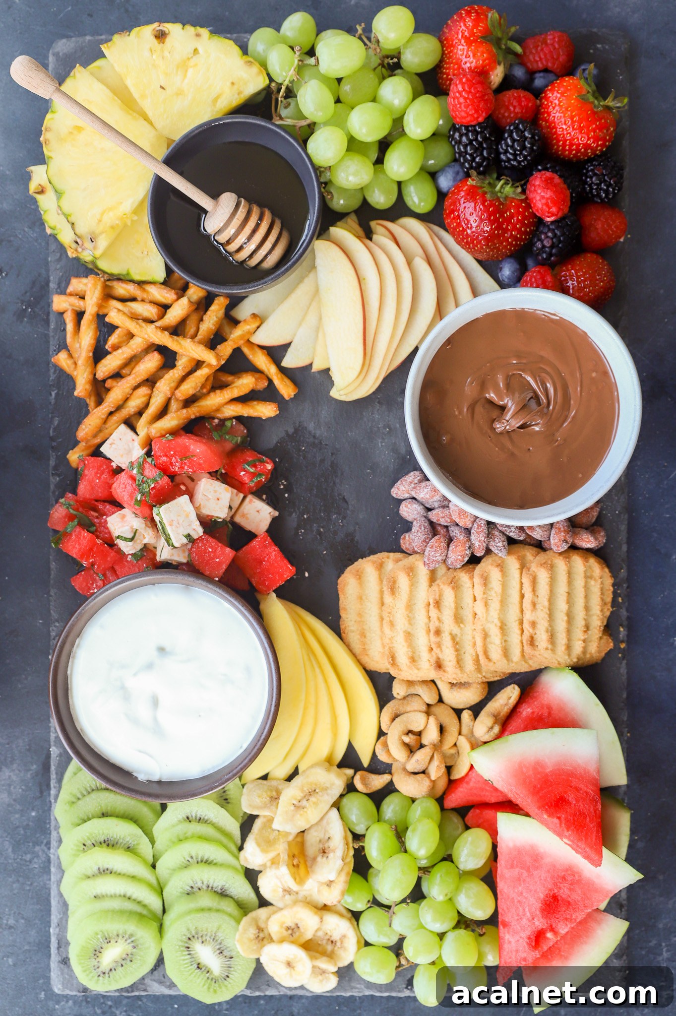 Fresh Fruit Charcuterie Board Ideas for Entertaining 7 Ingredients for a fruit charcuterie board on display