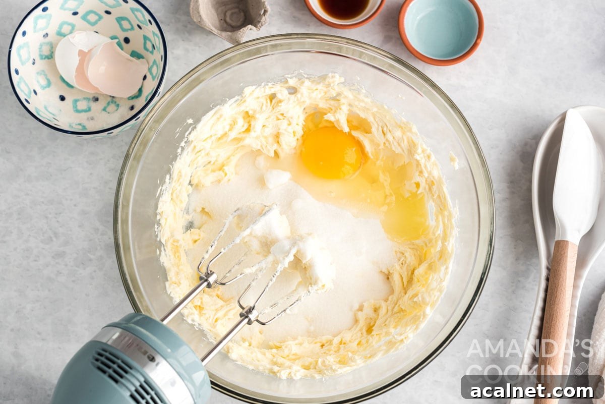 mixing eggs into cookie dough