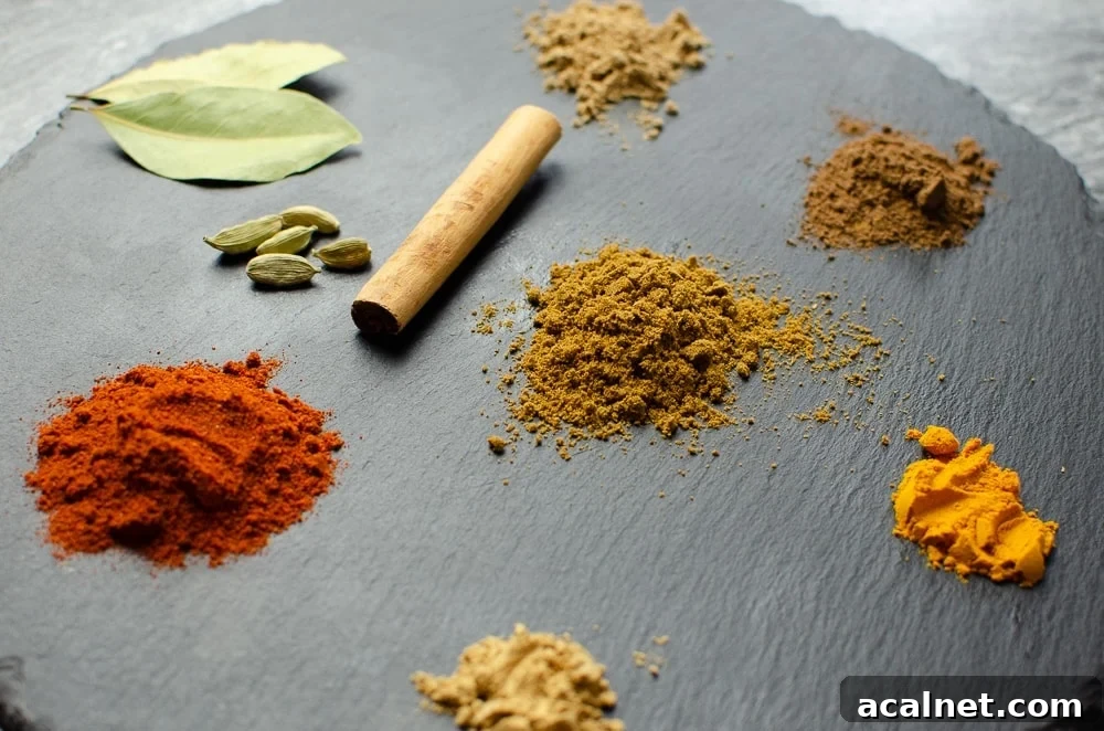 mix of paprika, cumin, allspice, ginger, turmeric and coriander. Plus a cinnamon stick & cardamom pods