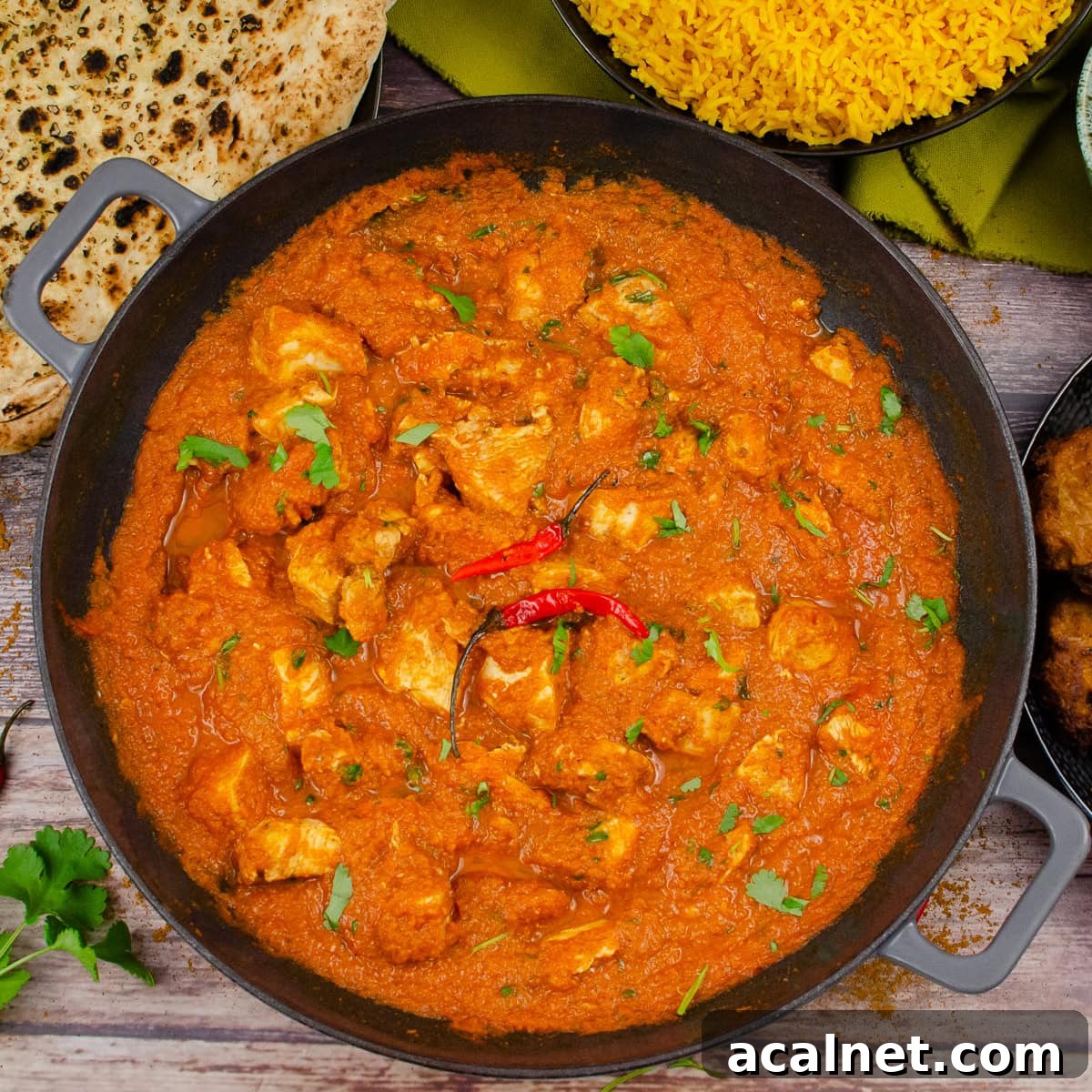 Chicken Pathia Curry in a cast iron pan
