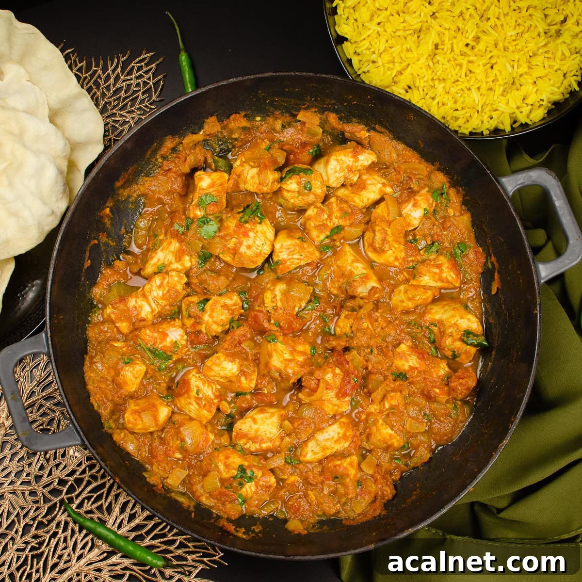 Takeaway style Chicken Bhuna Curry served in a cast iron pan