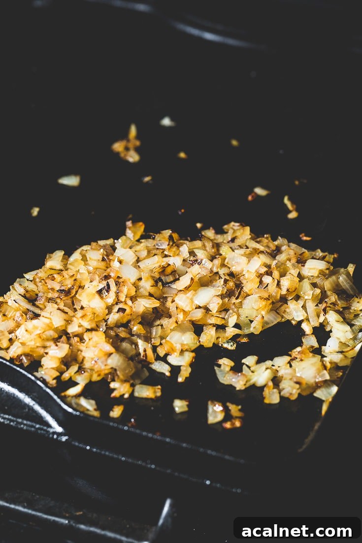 Crispy Flat-Top Cheeseburger Recipe with Caramelized Onions 2 flat top cheeseburger caramelized onions