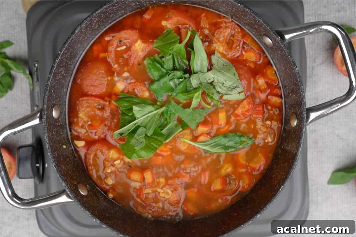 Italian basil added to the pan.
