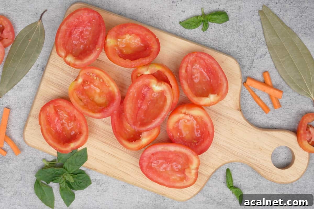 Tomatoes cut into half and seeds removed.